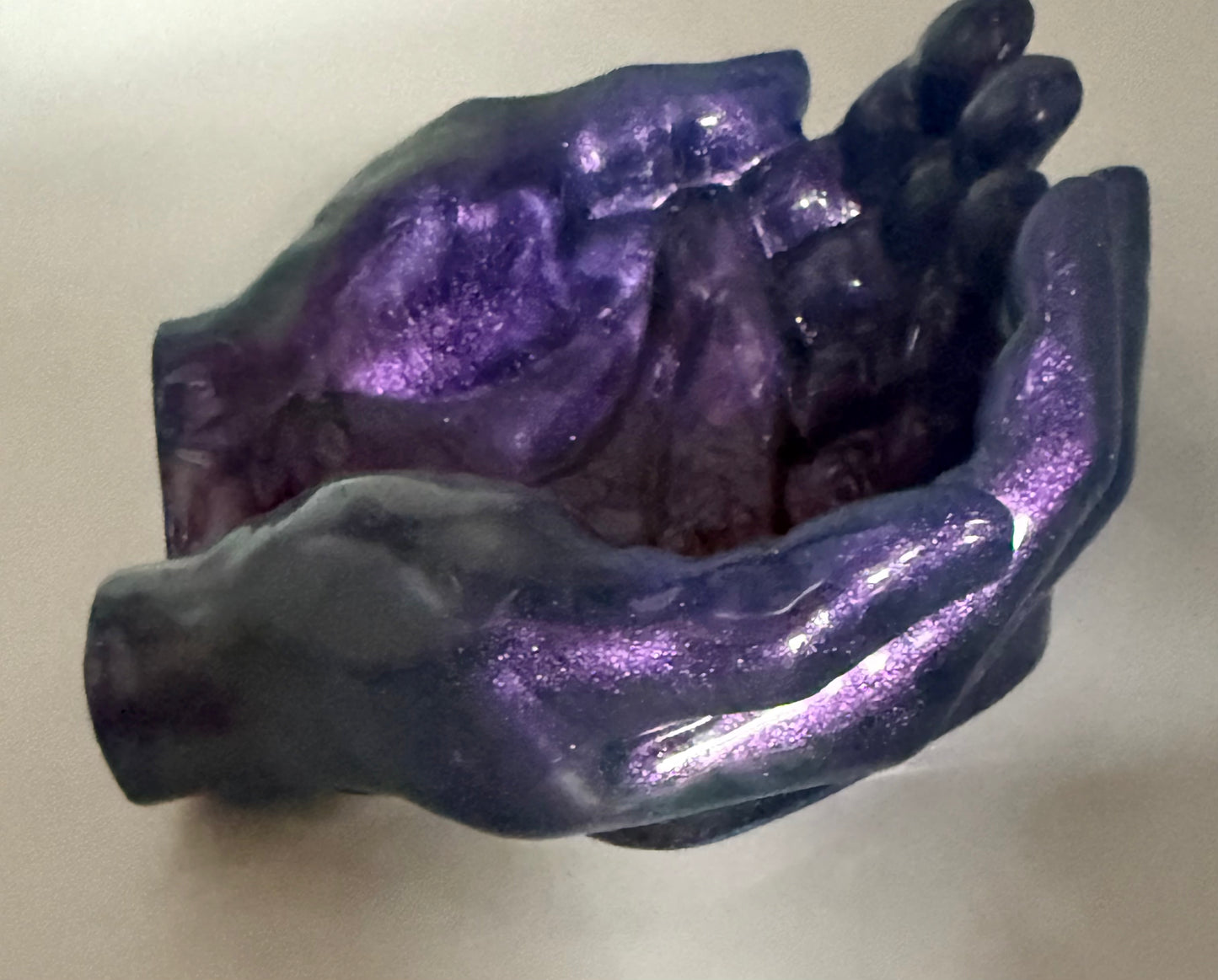 Large purple resin hand trinket tray.