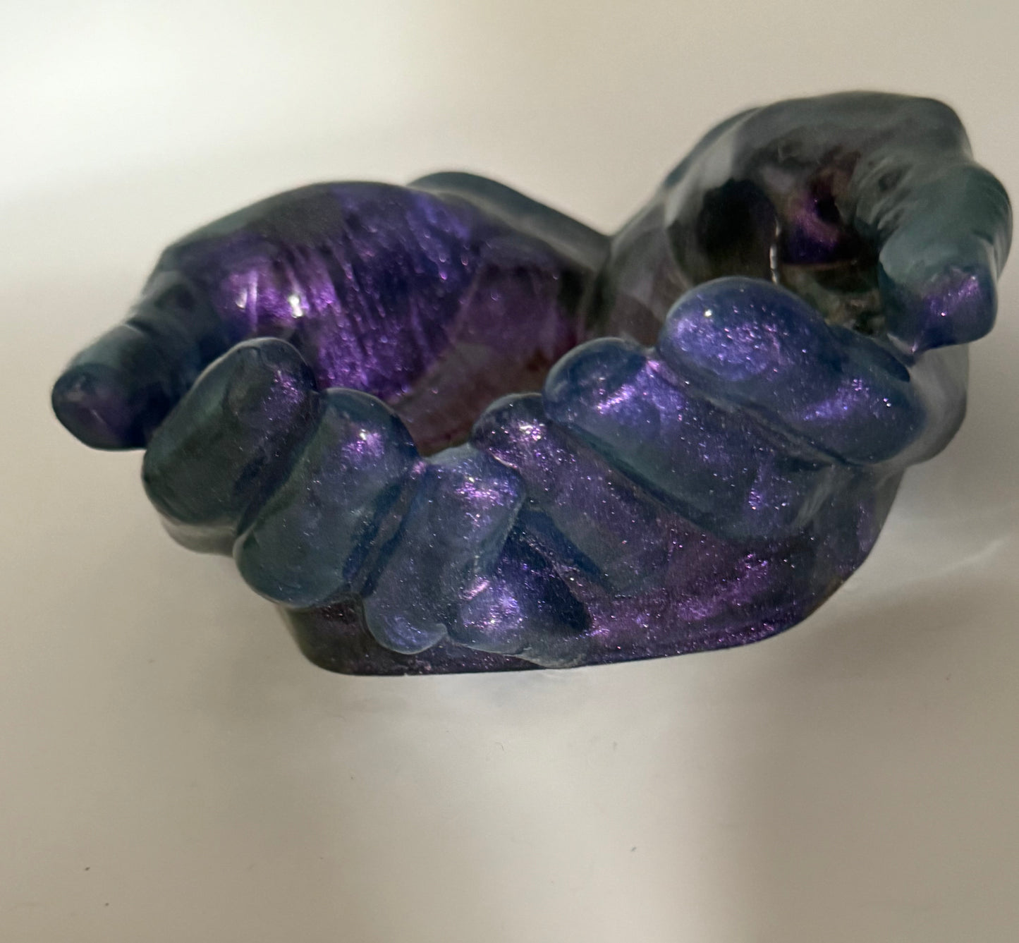 Large purple resin hand trinket tray.